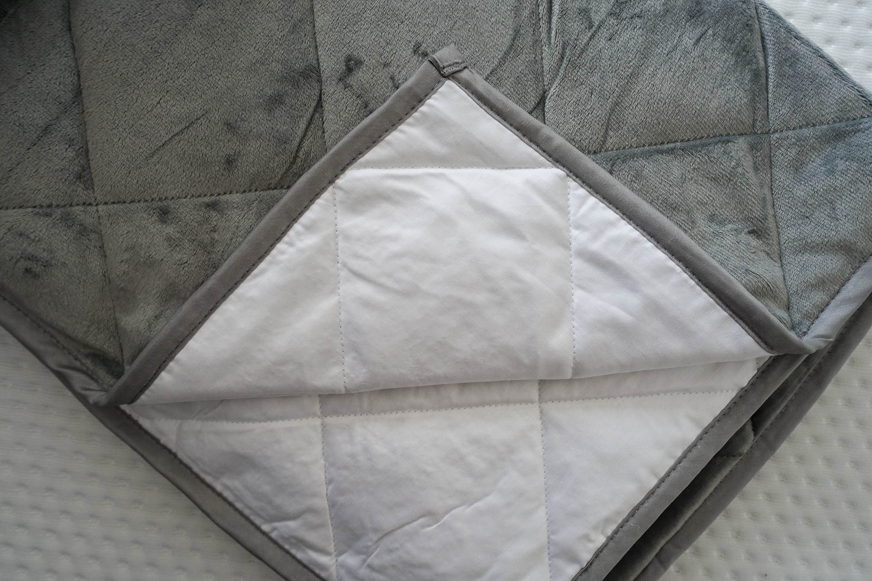 Aeyla mela weighted blanket fleece and cotton side
